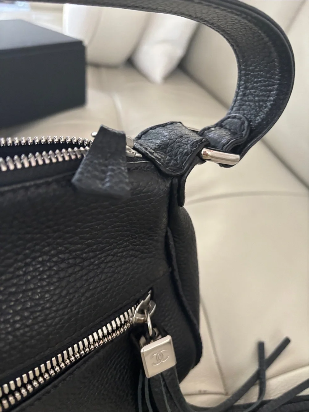 CHANEL Black Pebbled Leather Shoulder Bag with Tassel Zip